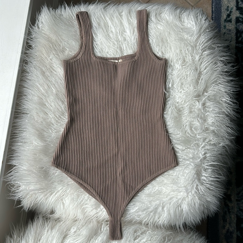 Brown body suit
